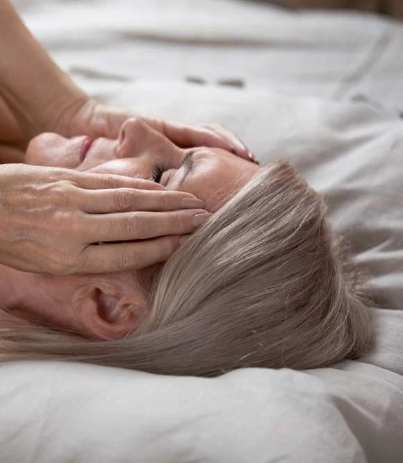 Woman relaxing, supporting hormonal and vaginal health with the right probiotic